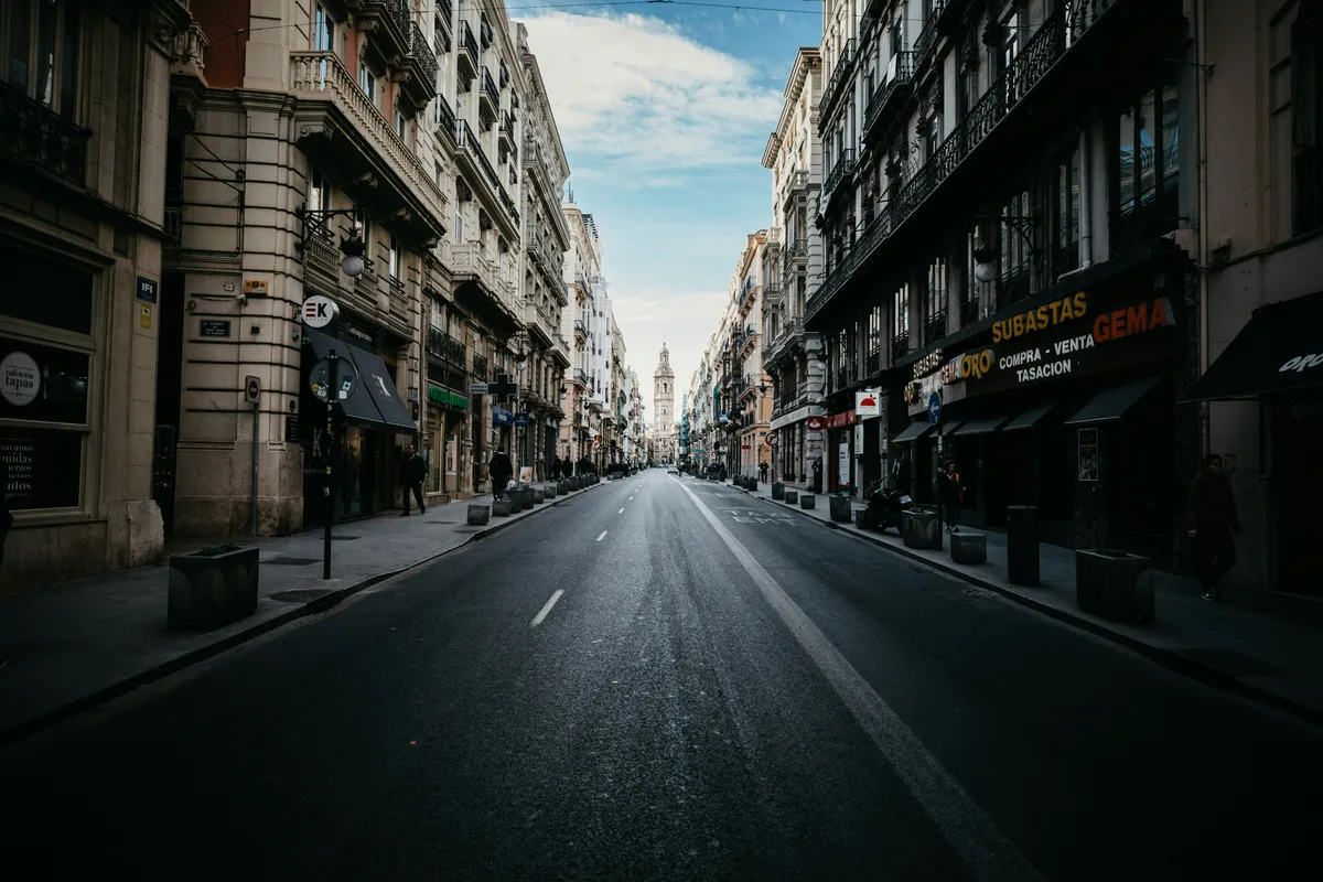 Quiet city street lined with historic buildings