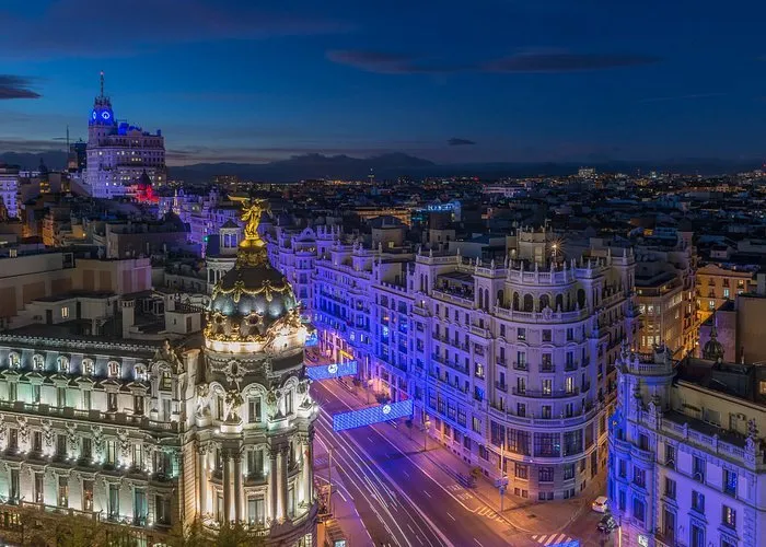 Madrid’s illuminated streets and buildings at dusk